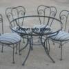 Nice heavy iron patio sets, four chairs and glass top table, priced 250.00 set.  