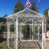 Beautiful 8 x 8 iron gazebo.  Three door openings and three windows.   There are six sides and six triangular tops.   Priced 695.    