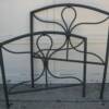 Light Weight Iron Twin Size Bed, complete with iron rails.   Priced 75.00