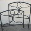 Light Weight Iron Twin Size Bed, complete with iron rails.   Priced 75.00